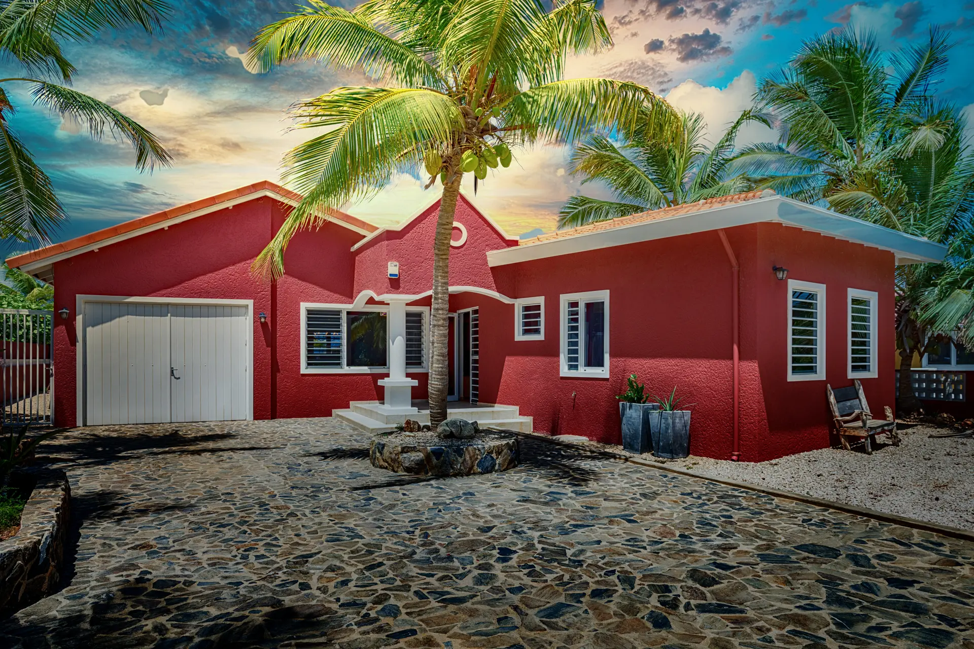 Front of the villa at sunset